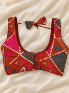 Rust Orange Multicolour Mirror Work Chaniya Choli Set with Geometric Embroidery
