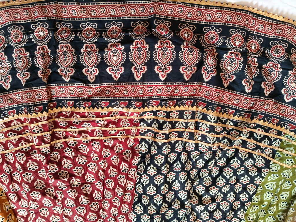 Atrangi Multicolour Ajrak Chaniya Choli with Green Dupatta