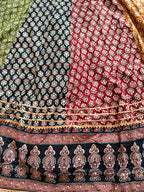 Atrangi Multicolour Ajrak Chaniya Choli with Green Dupatta