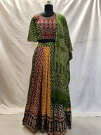 Atrangi Multicolour Ajrak Chaniya Choli with Green Dupatta