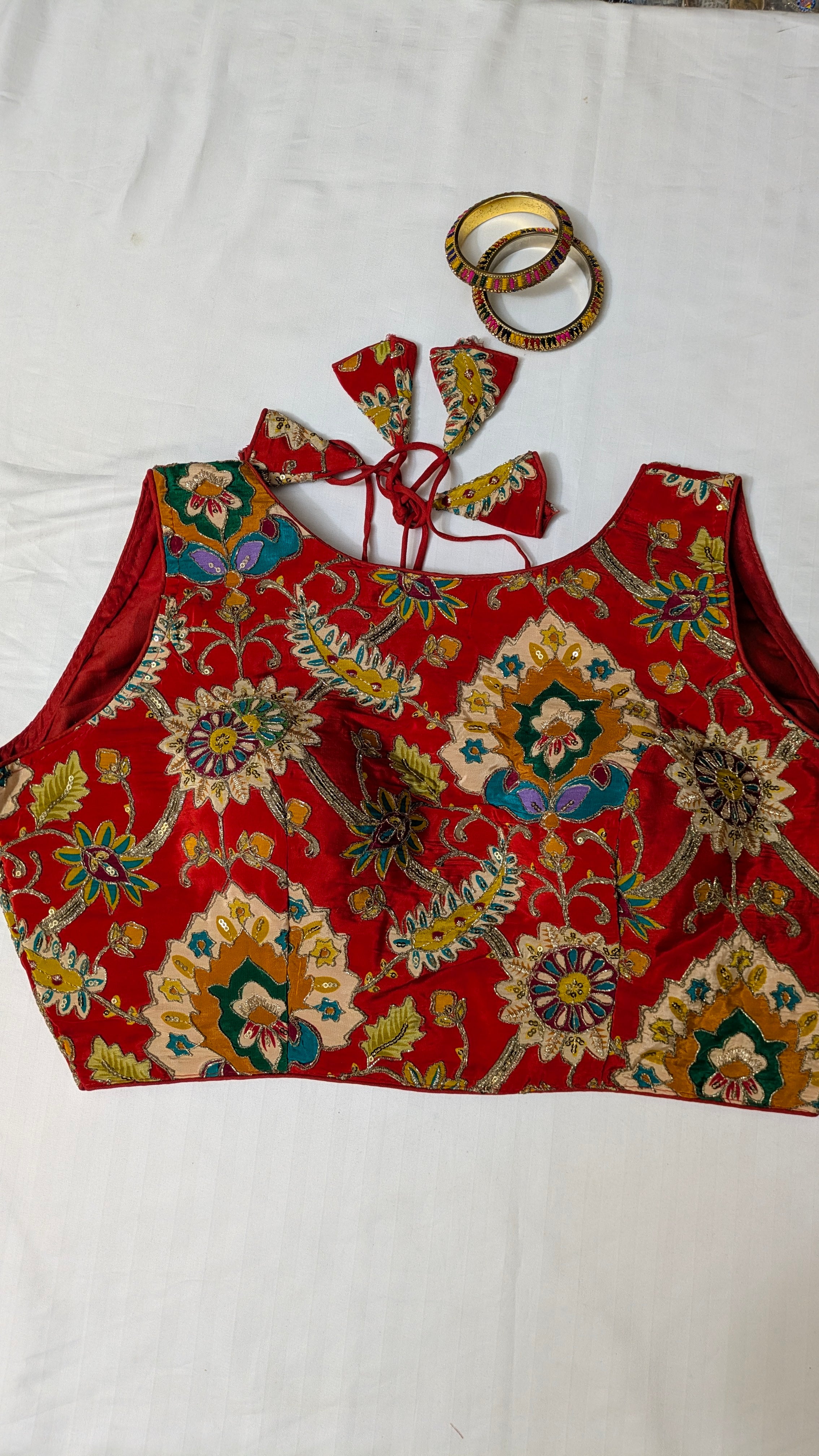 Floral high-neck sleeveless blouse