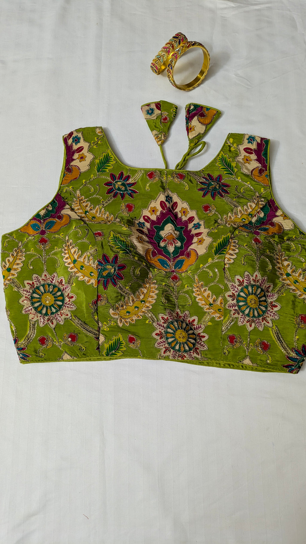 Floral high-neck sleeveless blouse