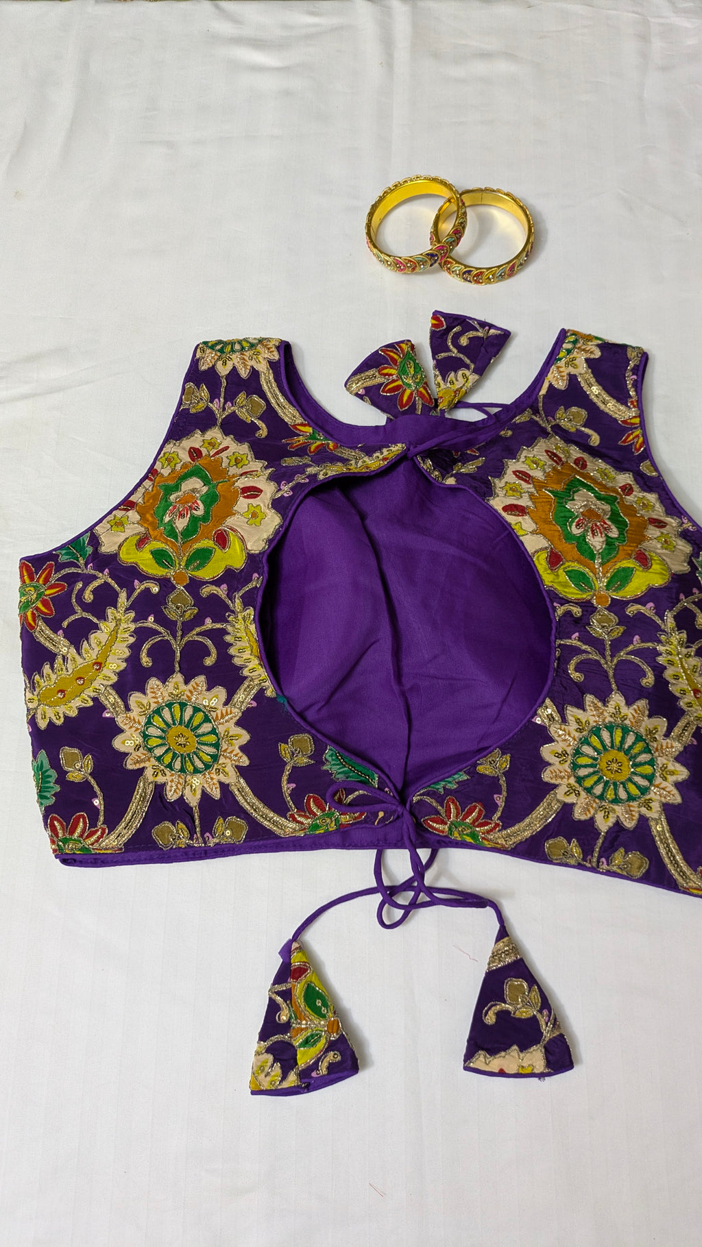 Floral high-neck sleeveless blouse