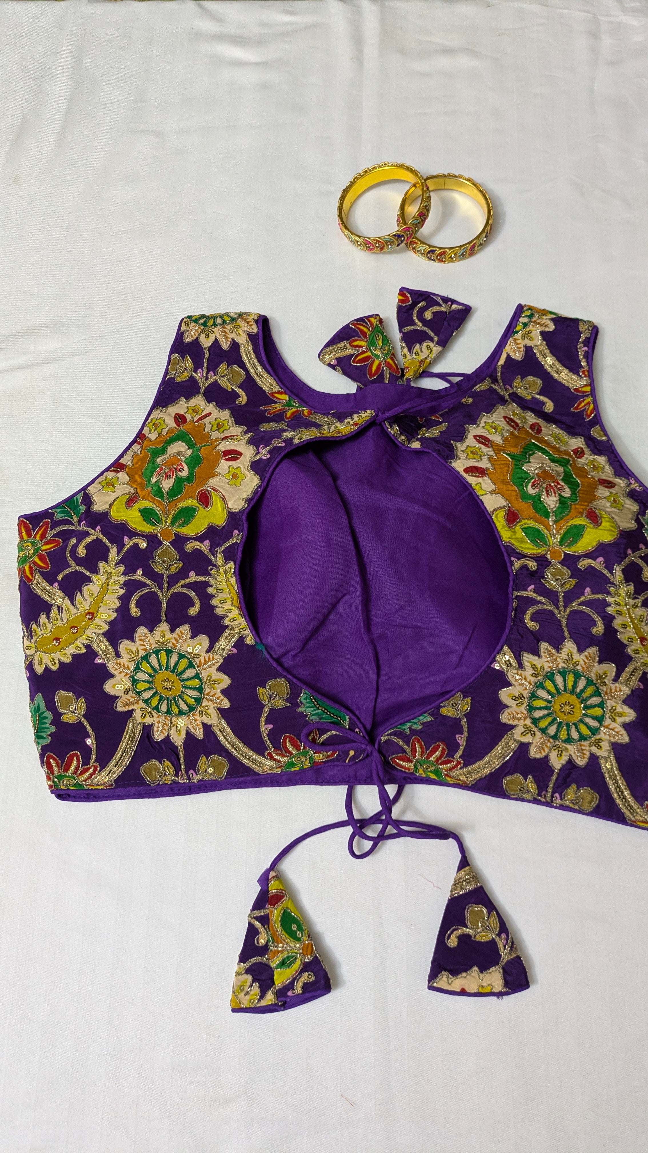 Floral high-neck sleeveless blouse