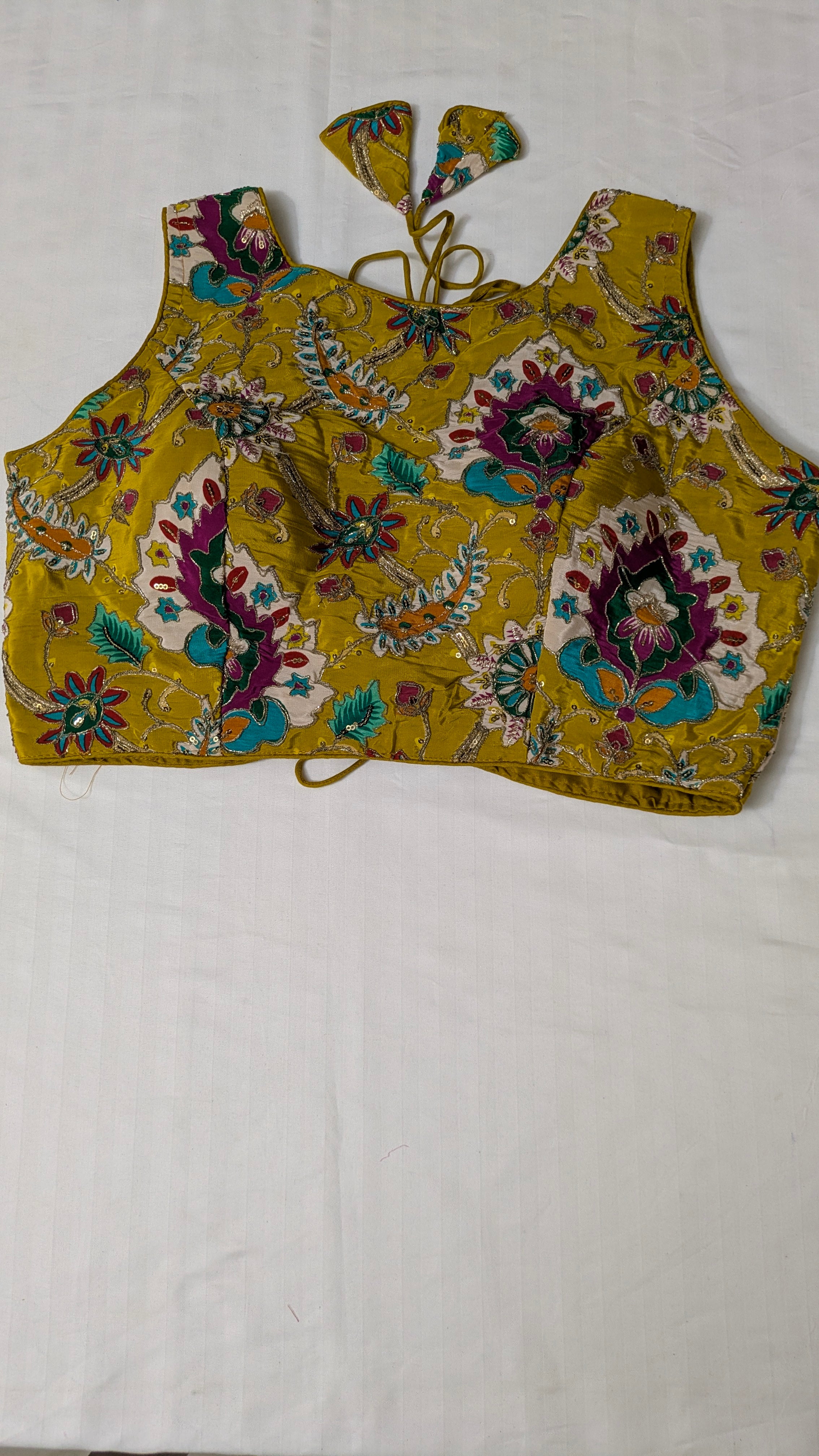 Floral high-neck sleeveless blouse