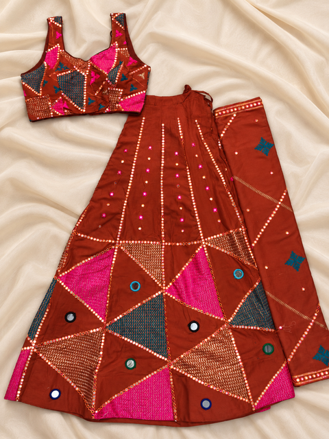 Rust Orange Multicolour Mirror Work Chaniya Choli Set with Geometric Embroidery
