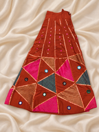 Rust Orange Multicolour Mirror Work Chaniya Choli Set with Geometric Embroidery