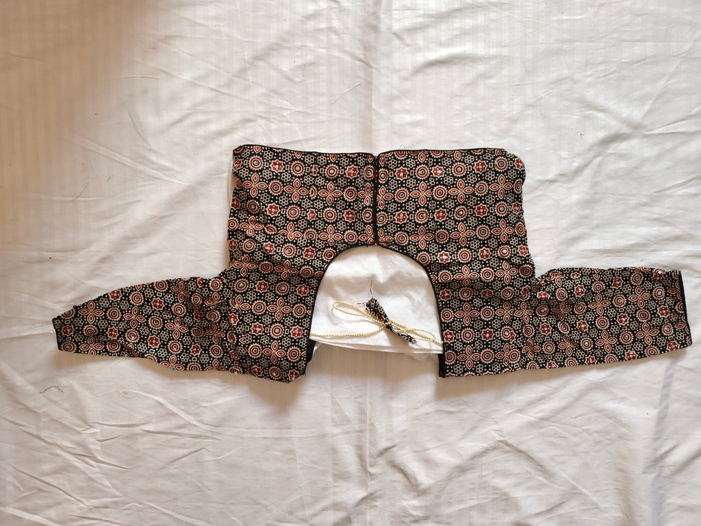 Ajrak Adaa blouse back design flat lay