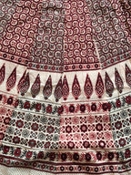 Ajrak lehenga cream and maroon border detail