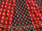 Red and black panelled Ajrak lehenga detail