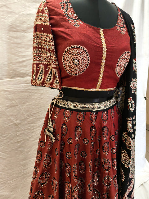 Rust red Ajrak blouse and lehenga close-up