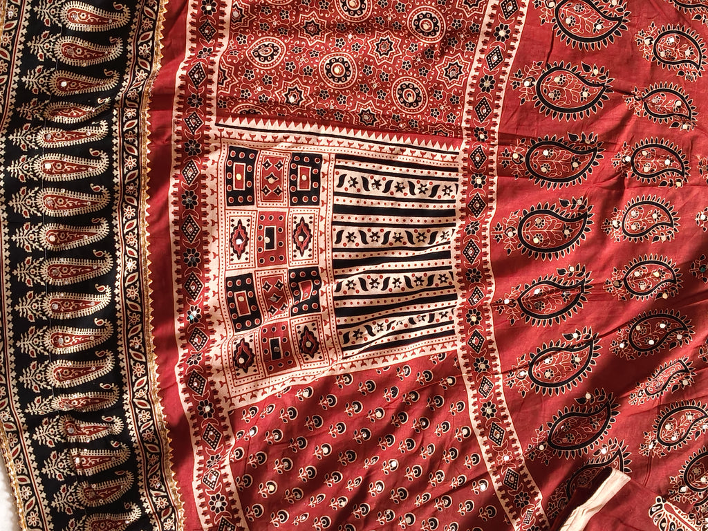Rust red Ajrak printed textile detail