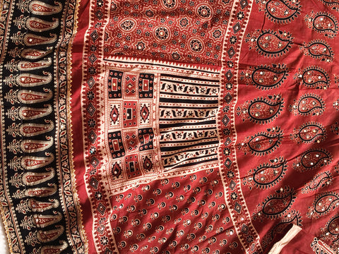 Rust red Ajrak printed textile detail