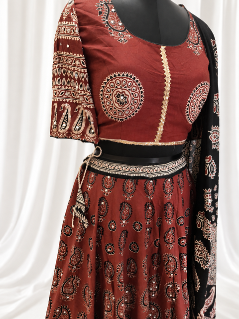 Ajrak Noor blouse close-up on white curtain