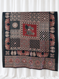Ajrakh Raas black and maroon cotton dupatta with mirror accents on white curtain background