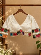 Ivory festive blouse detail