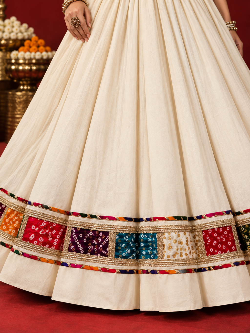 Ivory ghagara Bandhani strip border close-up