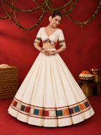 Apsara Aali ivory Bandhani strip mirror-work chania choli model view
