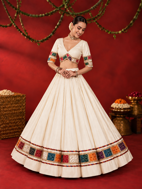 Apsara Aali ivory Bandhani strip mirror-work chania choli model view