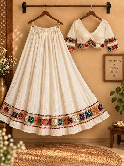 Ivory ghagara and Bandhani strip blouse product display