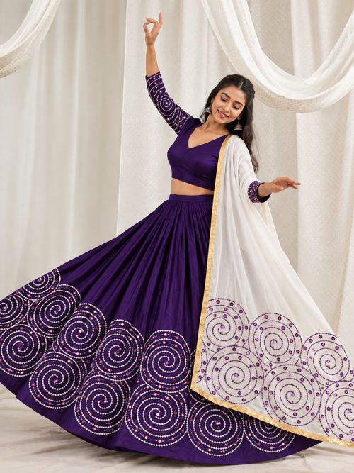 Purple chaniya choli and white dupatta on model