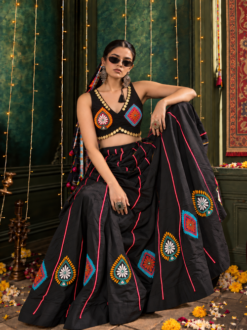 Model wearing black coin-trim patchwork Navratri blouse; lehenga styled separately