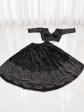 Black spiral mirror work chaniya choli set laid flat