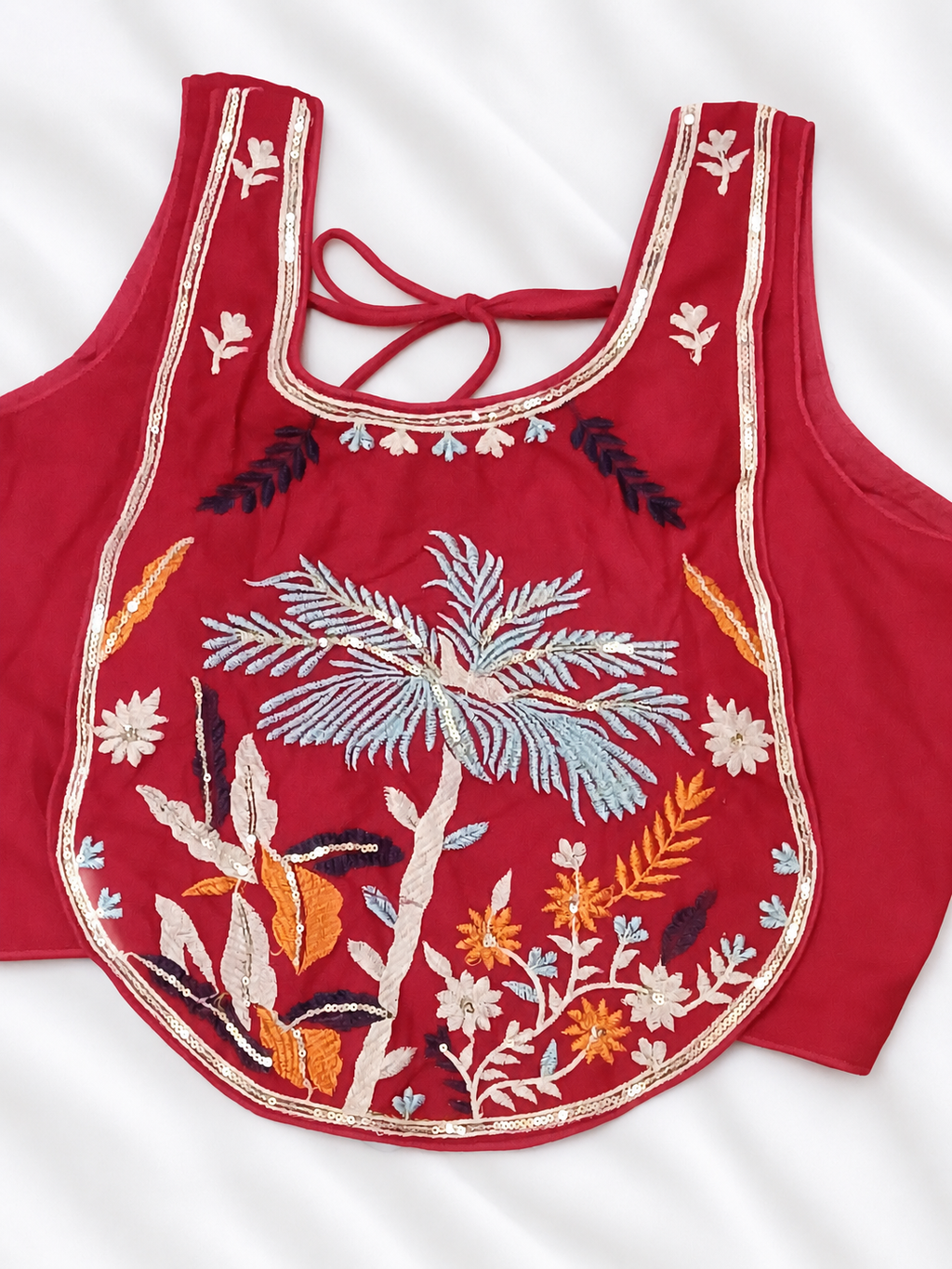Red embroidered blouse front view