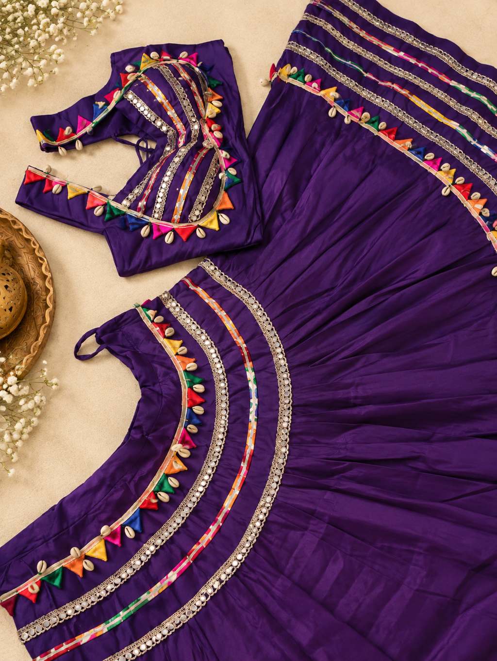 Purple lehenga and blouse cowrie work close-up