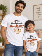 Father and son wearing matching Payasam Positive T-shirts