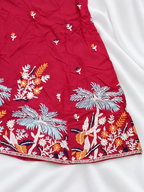 Red ghagara embroidery close-up
