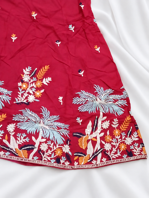 Red ghagara embroidery close-up