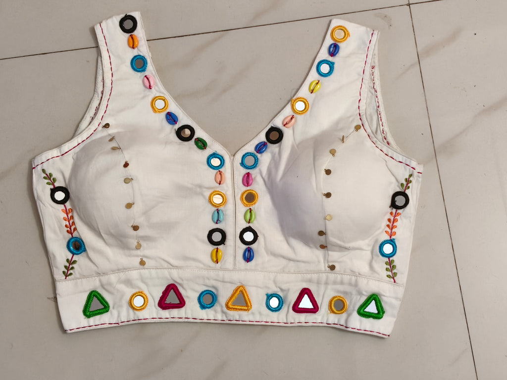 Ivory chaniya choli blouse with multicolour mirror and cowrie work