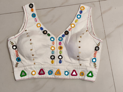 Ivory chaniya choli blouse with multicolour mirror and cowrie work
