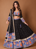 Model wearing Nachde Ne Saare Black Position Print & Golden Mirror Work Chaniya Choli Set