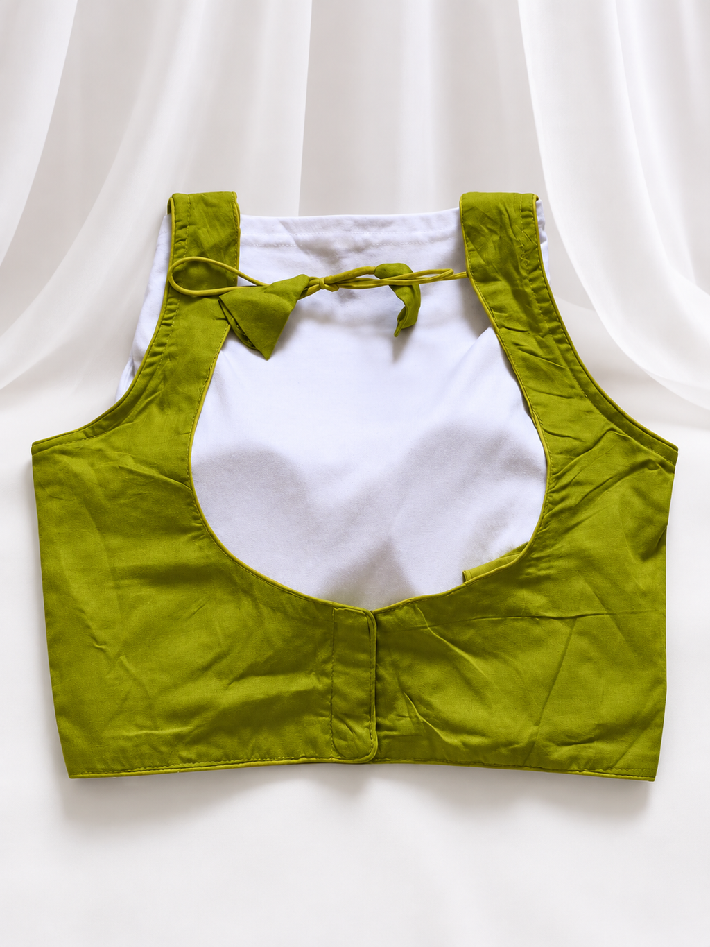 Green corset blouse back
