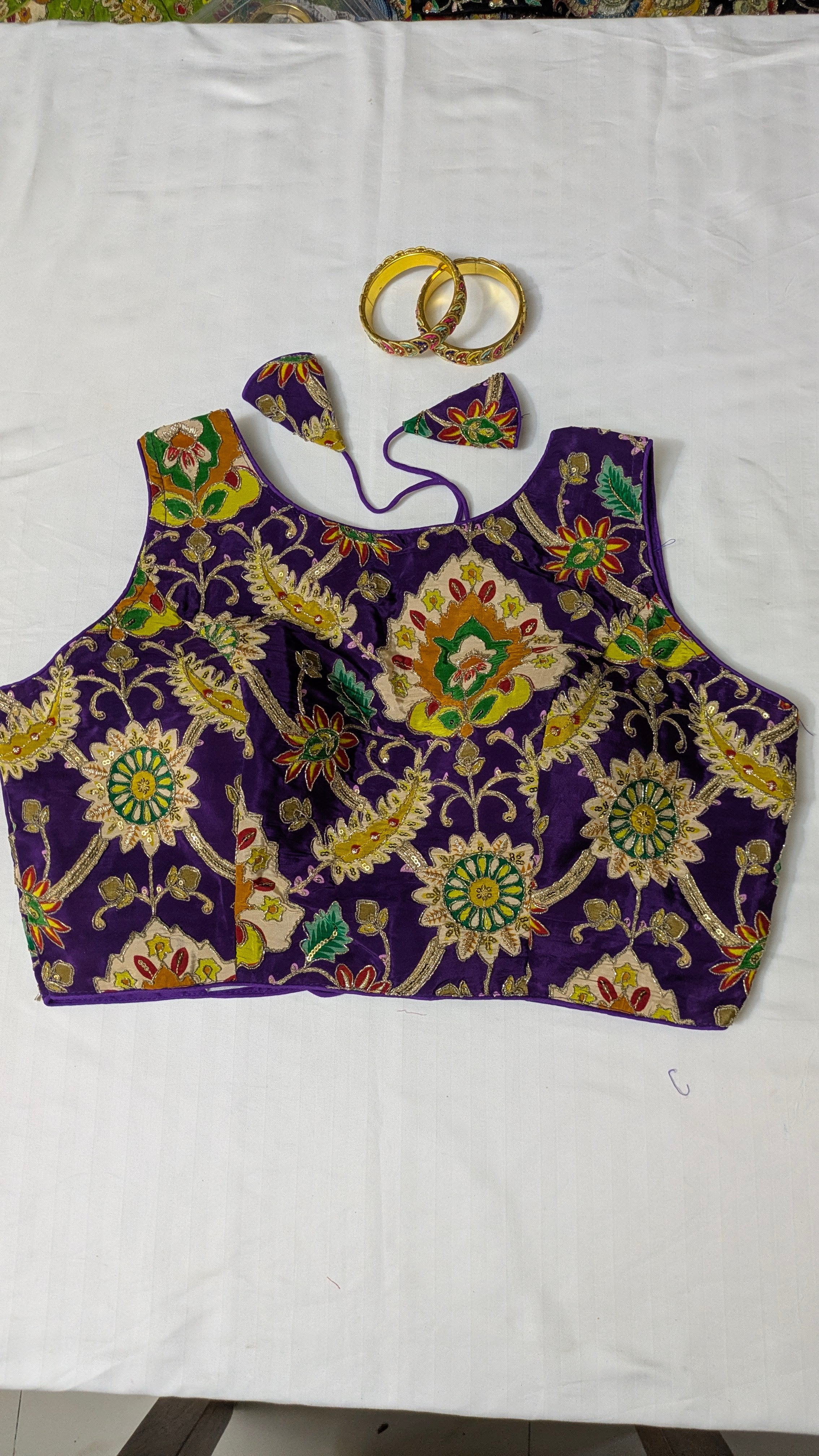 Floral high-neck sleeveless blouse