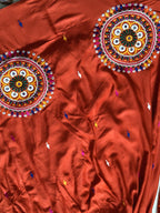 Rust orange lehenga embroidered motif detail