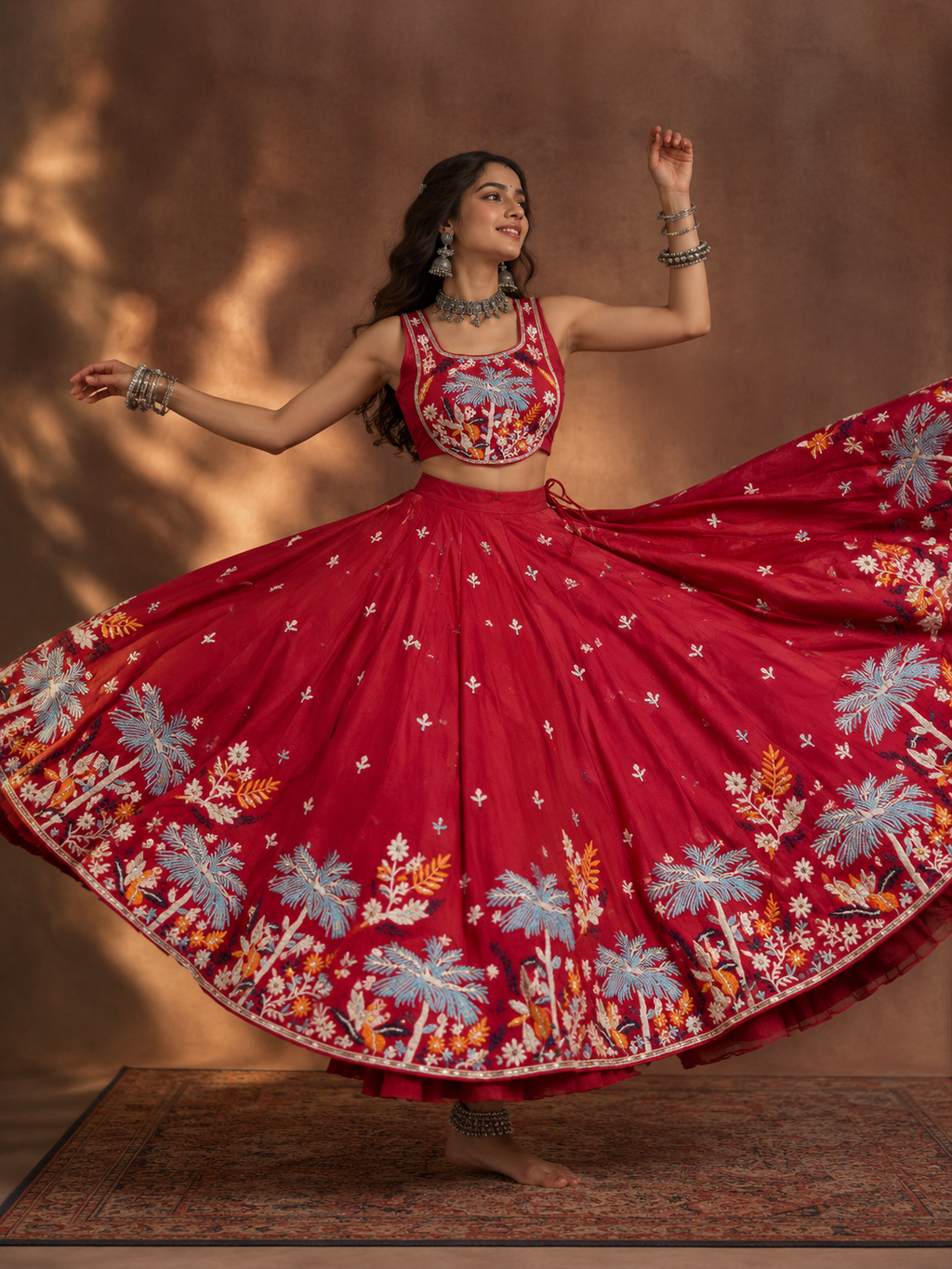 Model wearing red embroidered Navratri chaniya choli