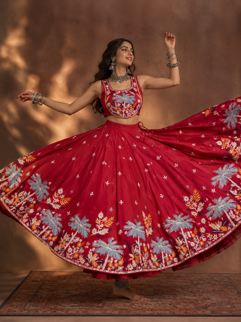 Model wearing red embroidered Navratri chaniya choli