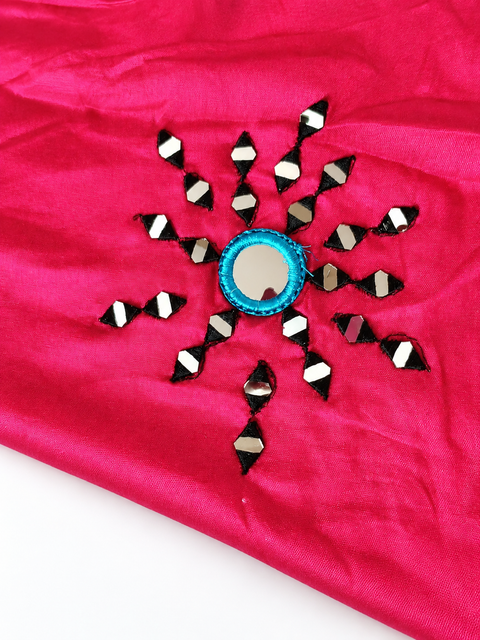 Circular mirror motif close-up